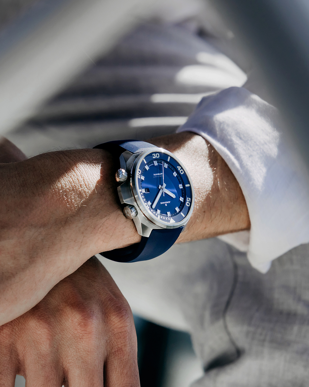 Junghans Aquaris Collection Junghans Aquaris collection with blue, red, and anthracite dial automatic dive watches